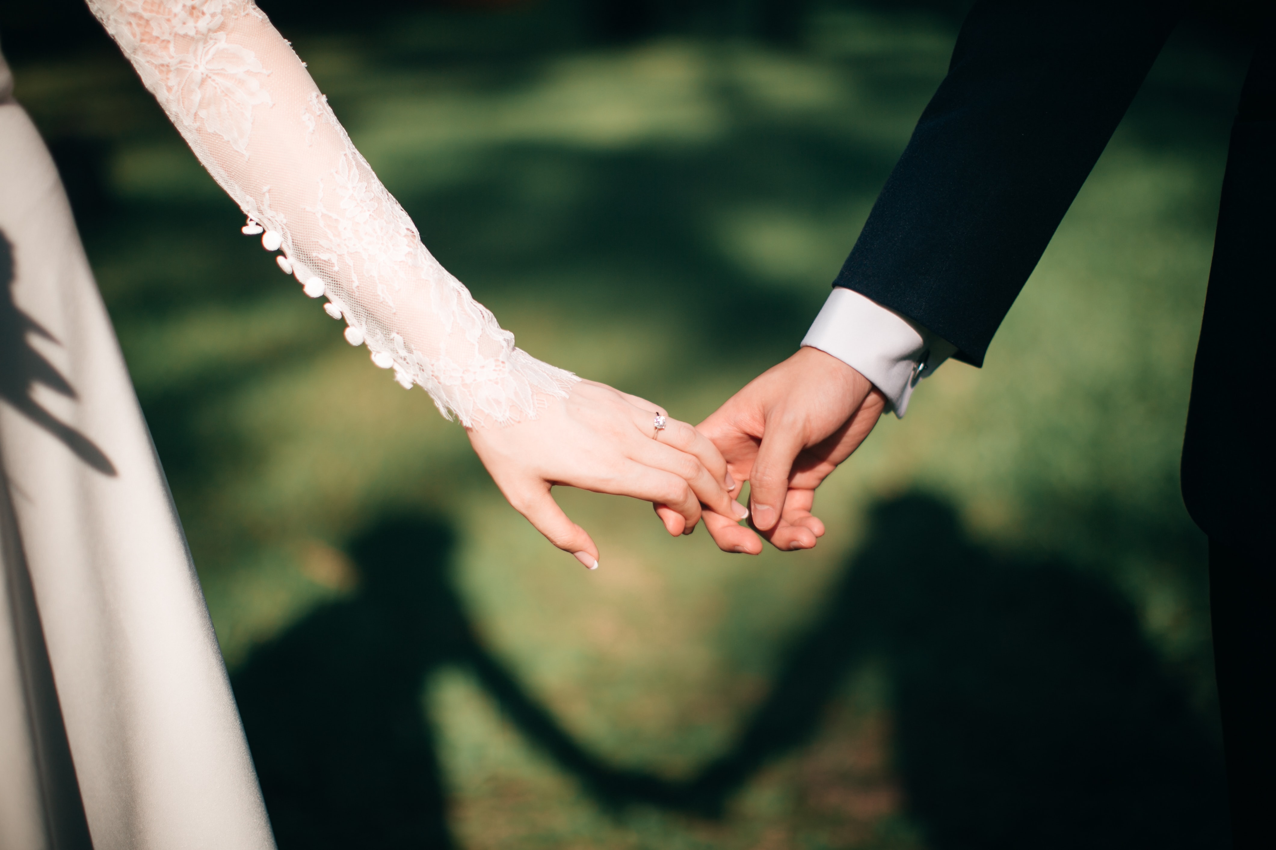 Wedding Season Finally Kicks off - couple holding hands